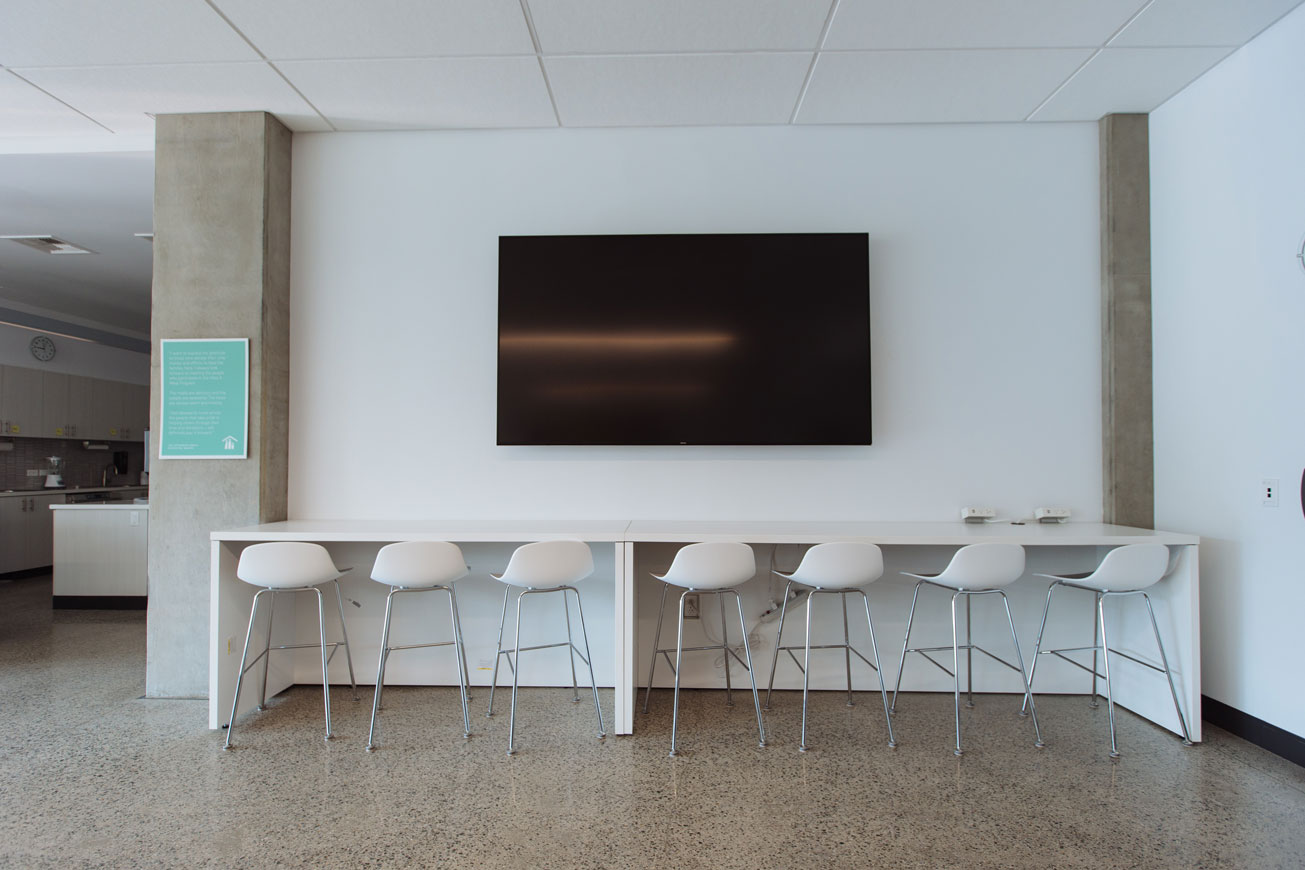 Community dining room TV with rotating resources