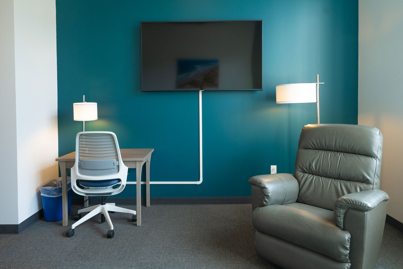 Guest room workspace, TV and recliner
